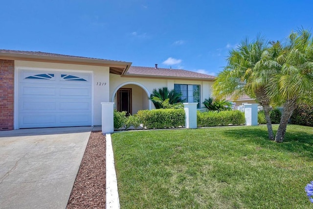 1219 Paseo Hermosa, Oceanside, CA 92056 - ranch-style home featuring driveway, a front yard, an attached garage, stucco siding, and brick siding