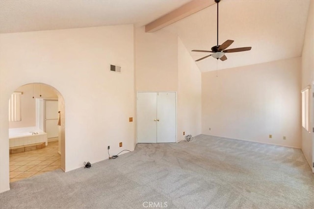 10151 Saddlehill Ter, Rancho Cucamonga, CA 91737 - carpeted spare room featuring ceiling fan, high vaulted ceiling, arched walkways, and beamed ceiling