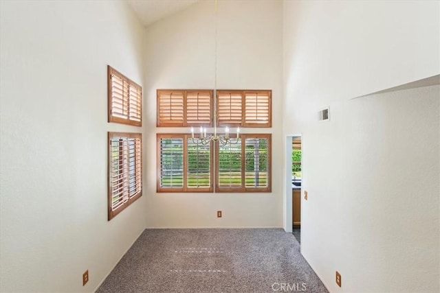 10151 Saddlehill Ter, Rancho Cucamonga, CA 91737 - carpeted spare room with a towering ceiling and a chandelier