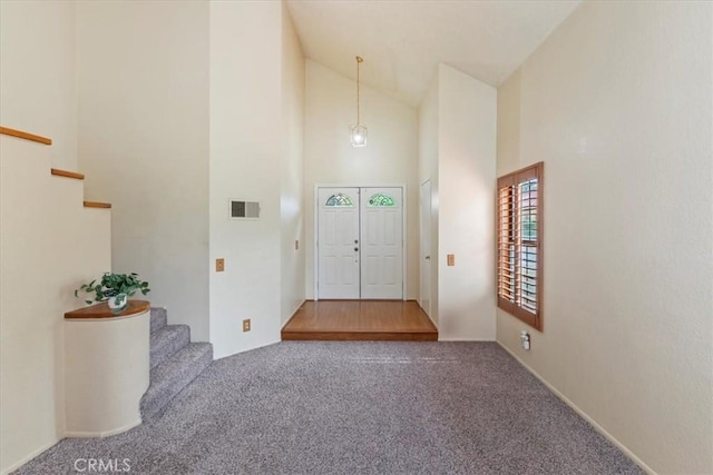 10151 Saddlehill Ter, Rancho Cucamonga, CA 91737 - carpeted entryway with high vaulted ceiling and stairs