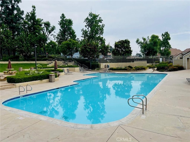 10151 Saddlehill Ter, Rancho Cucamonga, CA 91737 - community pool with a patio area