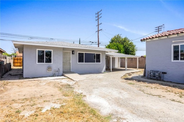 1163 W 3rd St, Pomona, CA 91766 - view of front of home featuring stucco siding