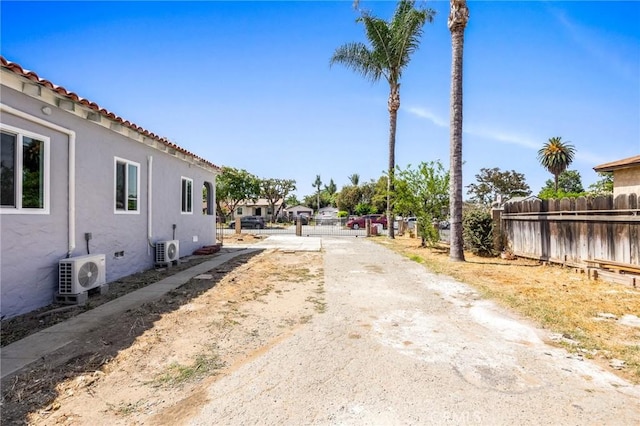 1163 W 3rd St, Pomona, CA 91766 - view of dirt / gravel driveway