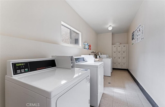 4705 Kester Ave Unit 209, Sherman Oaks, CA 91403 - community laundry room with separate washer and dryer and baseboards
