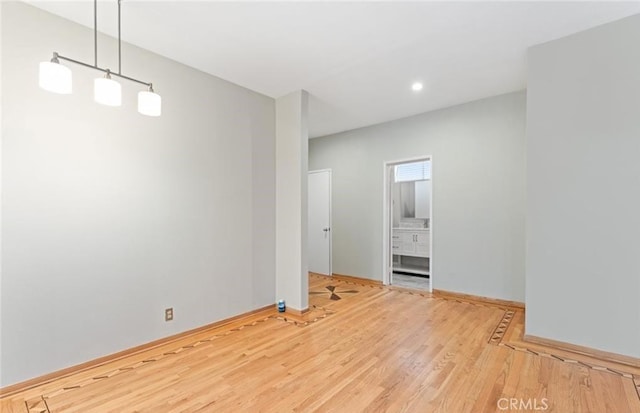 4705 Kester Ave Unit 209, Sherman Oaks, CA 91403 - spare room with wood finished floors and recessed lighting