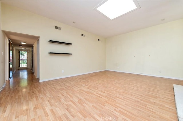 24 Queens Wreath Way, Irvine, CA 92612 - empty room featuring light wood finished floors and baseboards