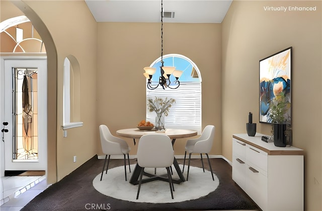 21777 Poppy Rd, Apple Valley, CA 92308 - dining area featuring a chandelier and arched walkways