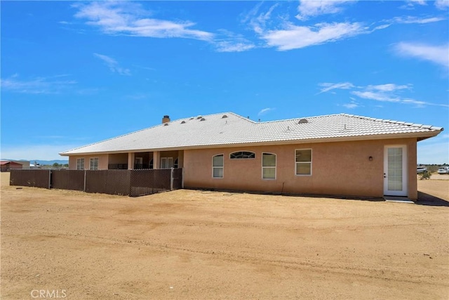 21777 Poppy Rd, Apple Valley, CA 92308 - rear view of property featuring a tile roof and stucco siding