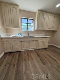 8129 Milna Ave, Whittier, CA 90606 - kitchen featuring dark wood-type flooring, light countertops, and recessed lighting