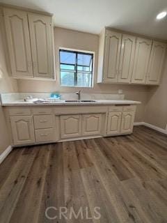 8129 Milna Ave, Whittier, CA 90606 - kitchen with dark wood finished floors, light countertops, and recessed lighting