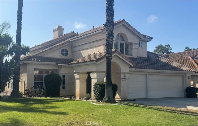8932 Mesa Oak Dr, Riverside, CA 92508 - view of front of home with stucco siding, a front lawn, and driveway