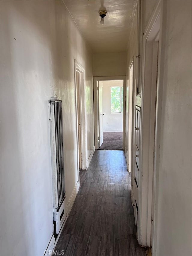 1086 N Bonnie Beach Pl, Los Angeles, CA 90063 - hall featuring dark wood-type flooring and baseboards