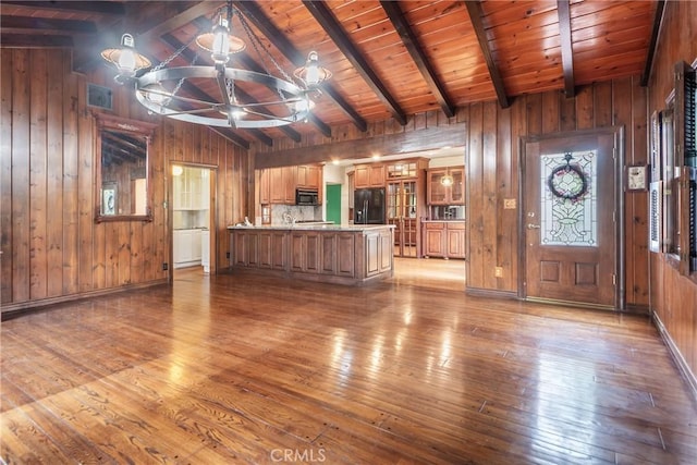 2322 W 156th St, Gardena, CA 90249 - living room featuring wood walls, ceiling fan, hardwood / wood-style flooring, and wooden ceiling