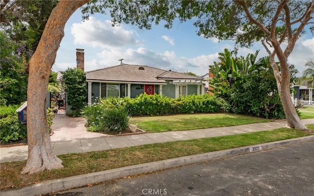 2322 W 156th St, Gardena, CA 90249 - view of front facade featuring a gate, a front yard, and a chimney