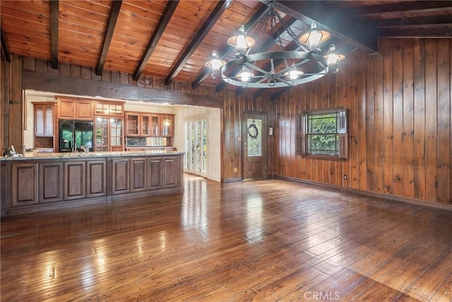 2322 W 156th St, Gardena, CA 90249 - unfurnished living room featuring wood walls, hardwood / wood-style flooring, wood ceiling, and a chandelier