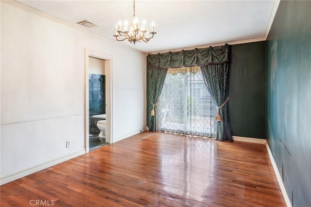 2322 W 156th St, Gardena, CA 90249 - spare room with a chandelier, crown molding, and wood finished floors
