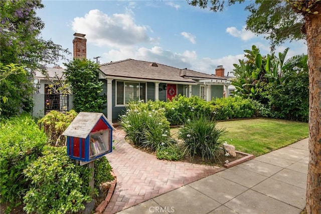 2322 W 156th St, Gardena, CA 90249 - rear view of house with a chimney and a lawn