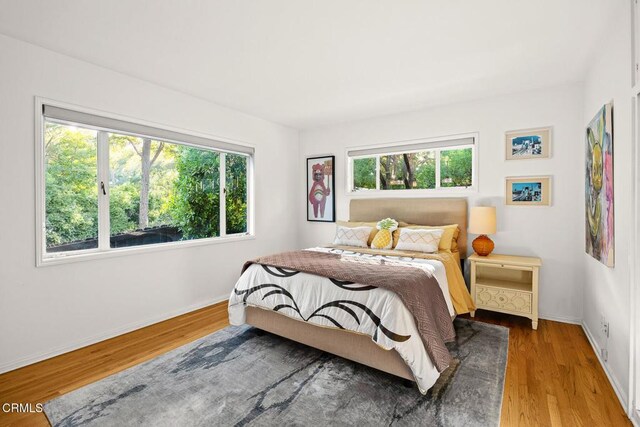 1620 Knollwood Dr, Pasadena, CA 91103 - bedroom with multiple windows and wood finished floors