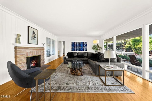 1620 Knollwood Dr, Pasadena, CA 91103 - living area featuring ornamental molding, a brick fireplace, and wood finished floors