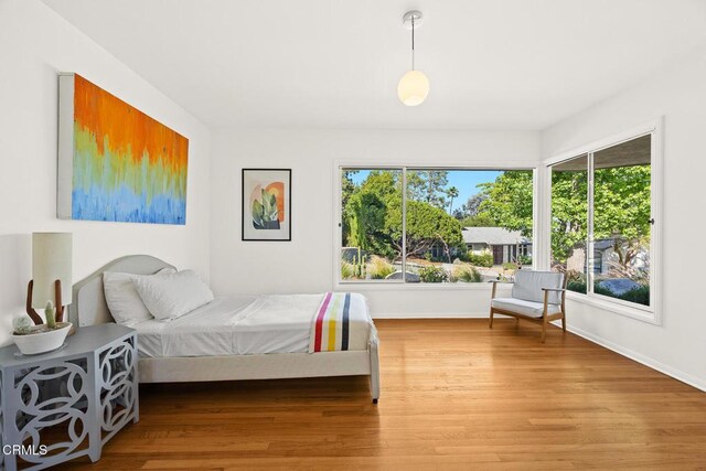 1620 Knollwood Dr, Pasadena, CA 91103 - bedroom with multiple windows and wood finished floors