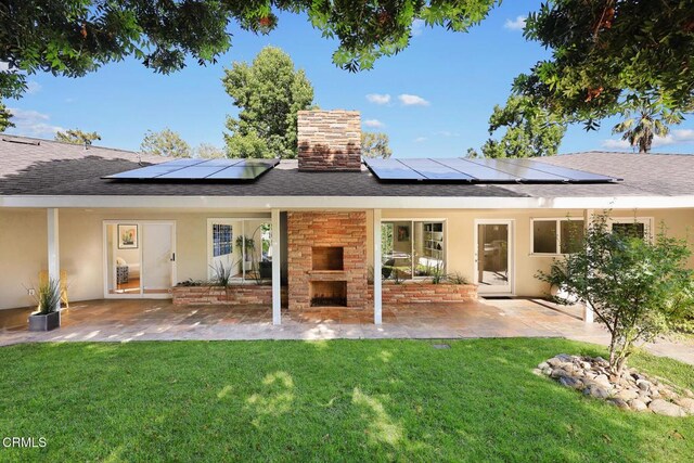 1620 Knollwood Dr, Pasadena, CA 91103 - rear view of house featuring an outdoor fireplace, a chimney, roof with shingles, and a patio area