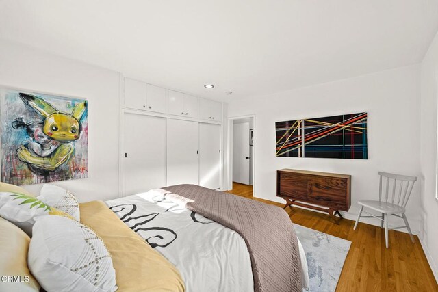 1620 Knollwood Dr, Pasadena, CA 91103 - bedroom with light wood-type flooring, a closet, and recessed lighting