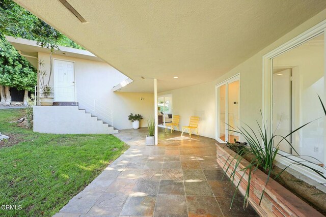 1620 Knollwood Dr, Pasadena, CA 91103 - entrance to property featuring stucco siding, a patio, and a lawn