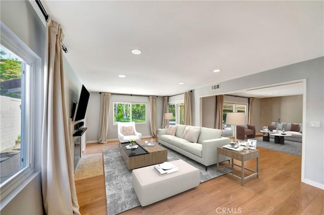 3811 Algonaut Dr, Calabasas, CA 91302 - living area featuring light wood finished floors and recessed lighting