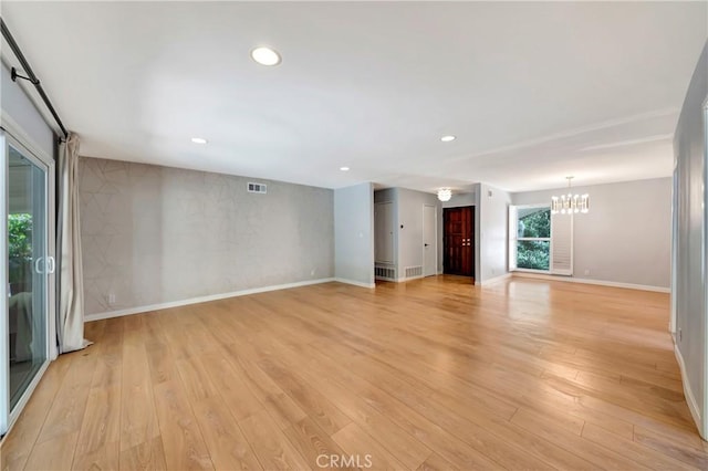 3811 Algonaut Dr, Calabasas, CA 91302 - spare room featuring a chandelier, light wood finished floors, and recessed lighting