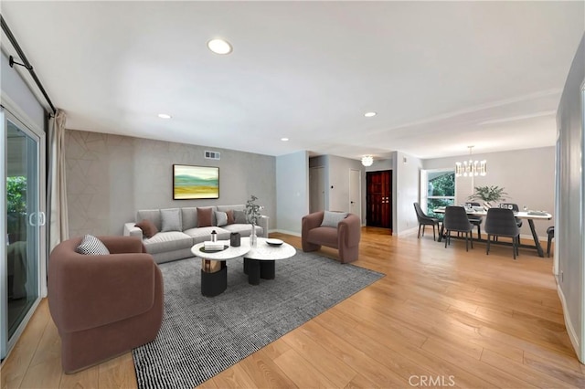 3811 Algonaut Dr, Calabasas, CA 91302 - living room featuring a chandelier, light wood-style floors, and recessed lighting