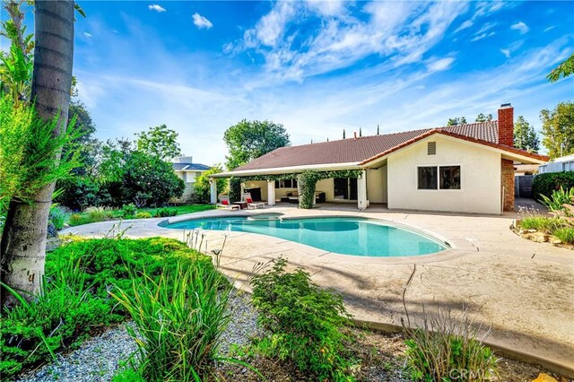 3811 Algonaut Dr, Calabasas, CA 91302 - view of swimming pool with a patio area