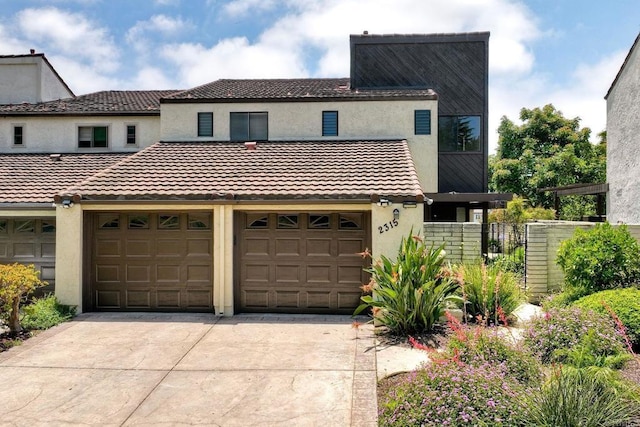 2315 Nicklaus Dr, Oceanside, CA 92056 - multi unit property with driveway, stucco siding, a tile roof, and a garage