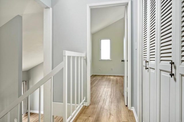 2315 Nicklaus Dr, Oceanside, CA 92056 - hall featuring light wood-style floors and vaulted ceiling