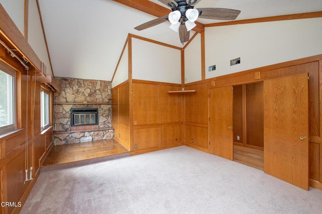 191 Haborview Ct, Ventura, CA 93003 - unfurnished living room with vaulted ceiling, ceiling fan, carpet, and a fireplace