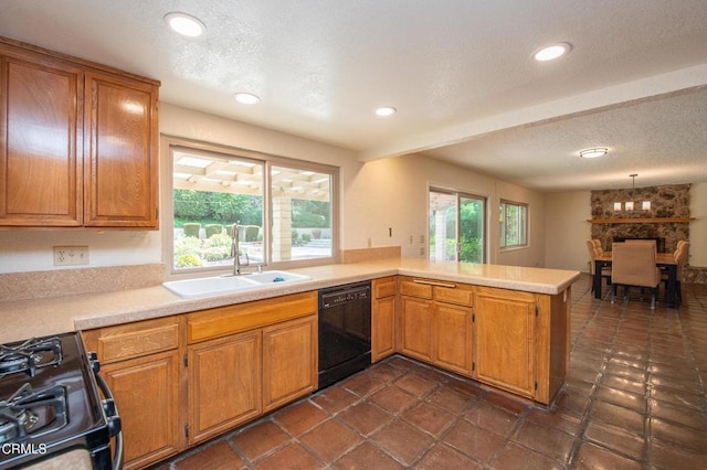 191 Haborview Ct, Ventura, CA 93003 - kitchen featuring black appliances, plenty of natural light, light countertops, a textured ceiling, and recessed lighting