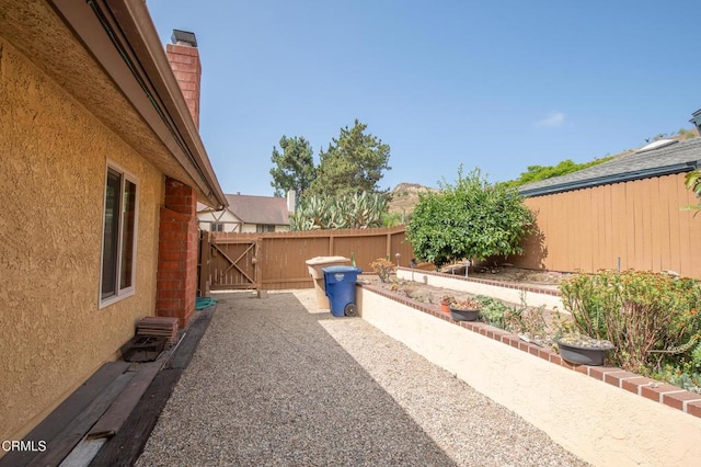 191 Haborview Ct, Ventura, CA 93003 - fenced backyard featuring a vegetable garden