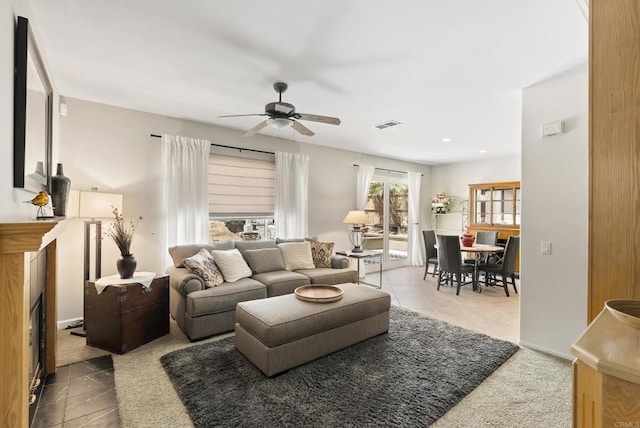 1222 N Creekside Dr, Chula Vista, CA 91915 - living area featuring a ceiling fan, a fireplace with flush hearth, and recessed lighting