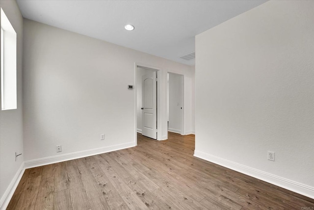 1679 Kincaid Ave, Chula Vista, CA 91913 - unfurnished room featuring wood finished floors and recessed lighting