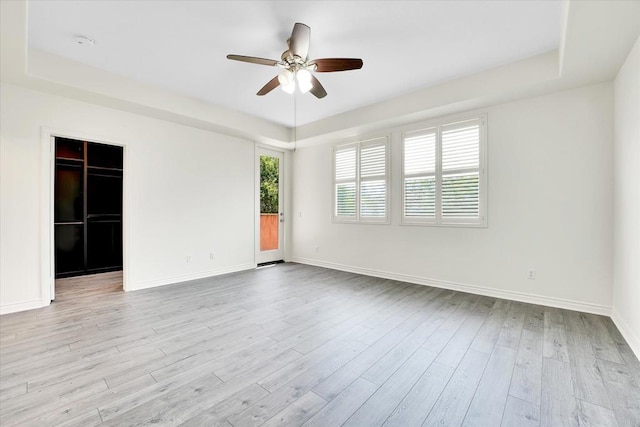 1679 Kincaid Ave, Chula Vista, CA 91913 - empty room with a raised ceiling, a ceiling fan, and wood finished floors