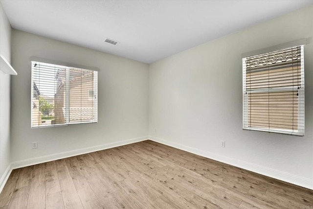 1679 Kincaid Ave, Chula Vista, CA 91913 - empty room featuring wood finished floors and baseboards