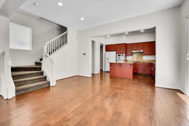1679 Kincaid Ave, Chula Vista, CA 91913 - unfurnished living room with hardwood / wood-style flooring, stairway, and recessed lighting