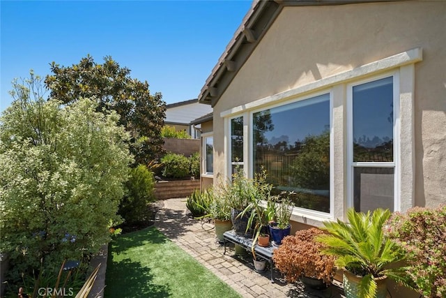 1432 Vicki Ln, Nipomo, CA 93444 - view of home's exterior featuring stucco siding and a patio