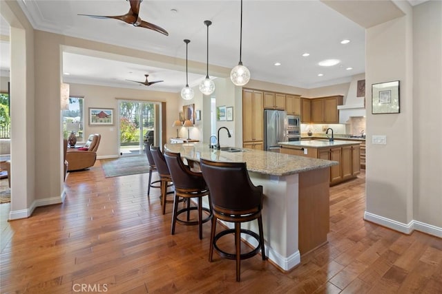 1432 Vicki Ln, Nipomo, CA 93444 - kitchen featuring a ceiling fan, appliances with stainless steel finishes, premium range hood, a center island with sink, and recessed lighting
