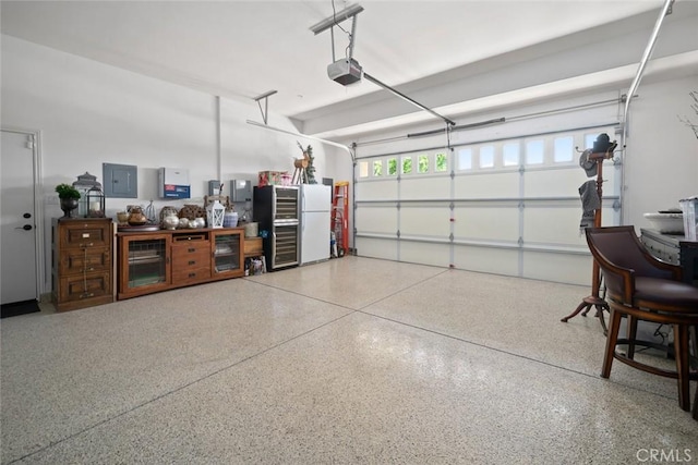 1432 Vicki Ln, Nipomo, CA 93444 - garage with electric panel, a garage door opener, and freestanding refrigerator