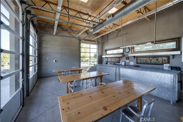 1432 Vicki Ln, Nipomo, CA 93444 - dining area featuring finished concrete flooring and a towering ceiling