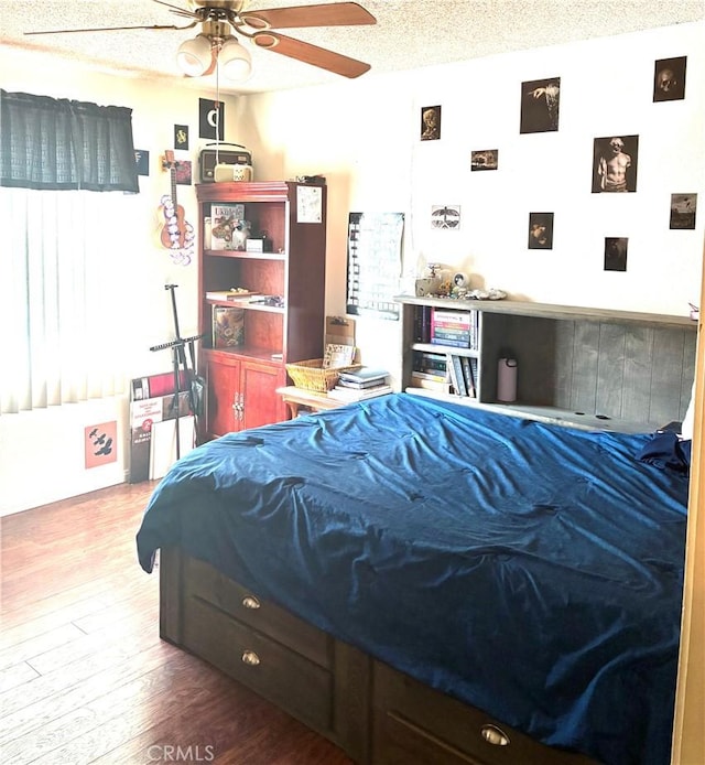 245 Broadway St, Lake Elsinore, CA 92530 - bedroom featuring wood finished floors, a textured ceiling, and ceiling fan