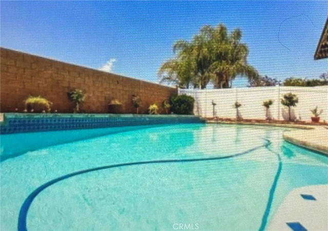 245 Broadway St, Lake Elsinore, CA 92530 - view of swimming pool with a fenced backyard