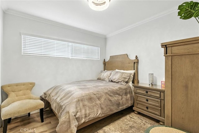 12516 Archwood St, North Hollywood, CA 91606 - bedroom featuring wood finished floors and crown molding
