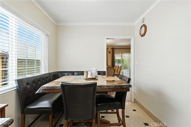 12516 Archwood St, North Hollywood, CA 91606 - dining room with crown molding and light tile patterned floors