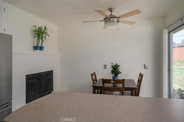 6354 Berkshire Ave, Paradise, CA 95969 - dining room with a fireplace and ceiling fan